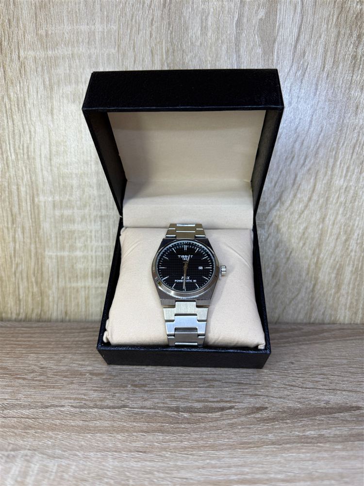 TISSOT ACIER BOITE SIMPLE